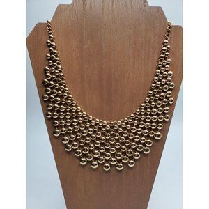 Bib gold tone statement necklace